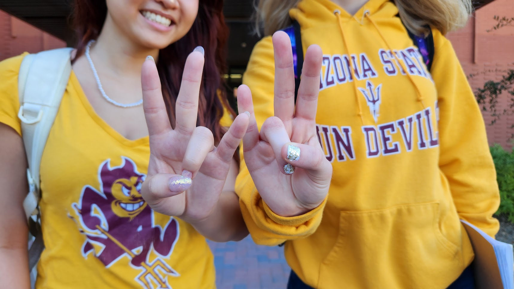 SILC Students making ASU pitchfork signs